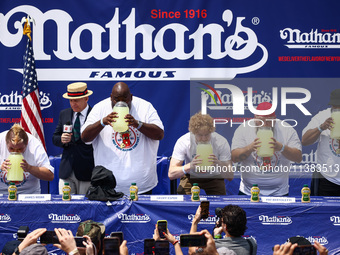 Contestants attend lemonade drinking contest during Nathan's Famous Hot Dogs Eating Contest which takes place annually at Coney Island on In...