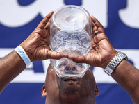 Contestants attend lemonade drinking contest during Nathan's Famous Hot Dogs Eating Contest which takes place annually at Coney Island on In...