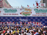 Contestants for the men's title during Nathan's Famous Hot Dogs Eating Contest which takes place annually at Coney Island on Independence Da...