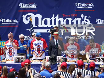 Contestants for the men's title during Nathan's Famous Hot Dogs Eating Contest which takes place annually at Coney Island on Independence Da...