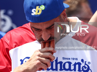 James Webb attends the men's title during Nathan's Famous Hot Dogs Eating Contest which takes place annually at Coney Island on Independence...