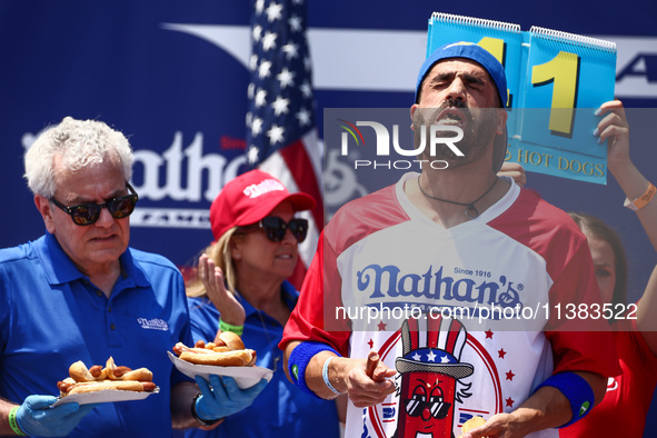 James Webb attends the men's title during Nathan's Famous Hot Dogs Eating Contest which takes place annually at Coney Island on Independence...