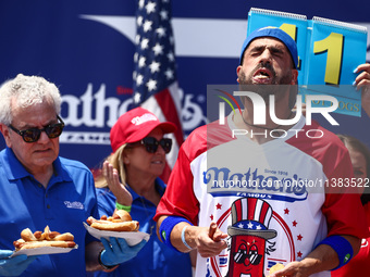 James Webb attends the men's title during Nathan's Famous Hot Dogs Eating Contest which takes place annually at Coney Island on Independence...