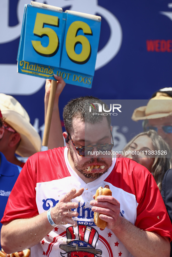 Patrick Bertoletti attends the men's title during Nathan's Famous Hot Dogs Eating Contest which takes place annually at Coney Island on Inde...