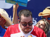 Patrick Bertoletti attends the men's title during Nathan's Famous Hot Dogs Eating Contest which takes place annually at Coney Island on Inde...