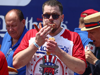 Patrick Bertoletti attends the men's title during Nathan's Famous Hot Dogs Eating Contest which takes place annually at Coney Island on Inde...