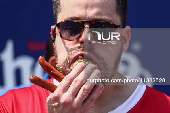 Patrick Bertoletti attends the men's title during Nathan's Famous Hot Dogs Eating Contest which takes place annually at Coney Island on Inde...