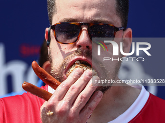 Patrick Bertoletti attends the men's title during Nathan's Famous Hot Dogs Eating Contest which takes place annually at Coney Island on Inde...