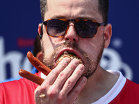 Patrick Bertoletti attends the men's title during Nathan's Famous Hot Dogs Eating Contest which takes place annually at Coney Island on Inde...