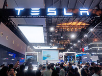 A Cyber off-road vehicle is being displayed at the Tesla booth at the WAIC World Artificial Intelligence Conference in Shanghai, China, on J...