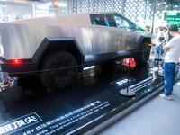 A Cyber off-road vehicle is being displayed at the Tesla booth at the WAIC World Artificial Intelligence Conference in Shanghai, China, on J...