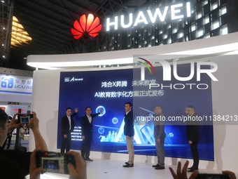 Huawei is releasing its AI education digitization program in the exhibition area at the WAIC World Artificial Intelligence Conference in Sha...