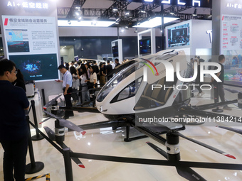 A low-altitude aircraft is displaying at the CITIC Group exhibition area at the WAIC World Artificial Intelligence Conference in Shanghai, C...