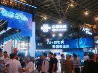 Visitors are visiting the China Unicom exhibition area at the WAIC World Artificial Intelligence Conference in Shanghai, China, on July 4, 2...