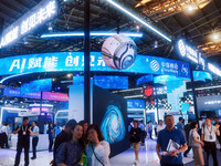 Visitors are visiting the China Mobile exhibition area at the WAIC World Artificial Intelligence Conference in Shanghai, China, on July 4, 2...