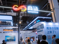 Visitors are visiting SenseTime's stand at the WAIC World Artificial Intelligence Conference in Shanghai, China, on July 4, 2024. (