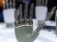 A humanoid robot's hand is being seen at the World Artificial Intelligence Conference at the Shanghai World Expo Exhibition Center in Shangh...