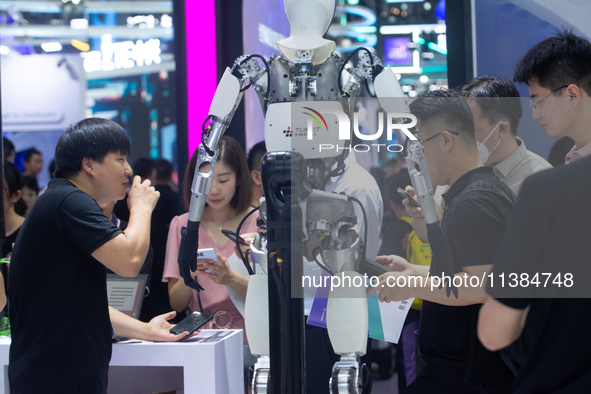 Visitors are visiting the World Artificial Intelligence Conference at the Shanghai World Expo Exhibition Center in Shanghai, China, on July...