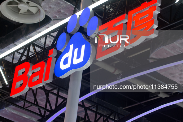 The logo of Baidu is being seen at the Baidu stand at the World Artificial Intelligence Conference at the Shanghai World Expo Exhibition Cen...