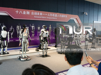 18 Humanoid Robot Vanguard Matrix are being displayed at the entrance of WAIC, World Artificial Intelligence Conference at Shanghai World Ex...