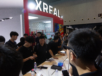 Visitors are visiting the Xreal stand at the World Artificial Intelligence Conference at the Shanghai World Expo Exhibition Center in Shangh...