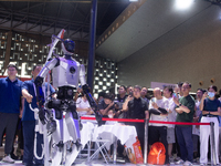 A humanoid robot is performing walking at the World Artificial Intelligence Conference at the Shanghai World Expo Exhibition Center in Shang...