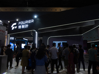 Visitors are visiting the World Artificial Intelligence Conference at the Shanghai World Expo Exhibition Center in Shanghai, China, on July...