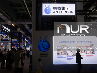 Visitors are visiting the Ant Group stand at the World Artificial Intelligence Conference at the Shanghai World Expo Exhibition Center in Sh...