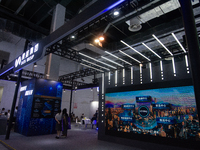 Visitors are visiting the Data Group stand at the World Artificial Intelligence Conference at the Shanghai World Expo Exhibition Center in S...