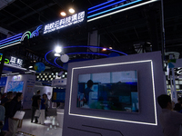 Visitors are visiting the Ant Cloud Technology group stand at the World Artificial Intelligence Conference at the Shanghai World Expo Exhibi...