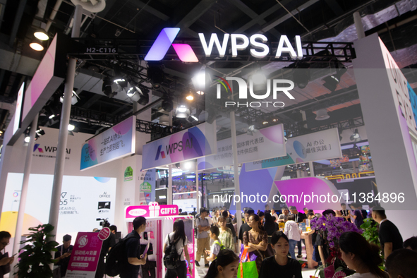 Visitors are visiting the WPS AI stand at the World Artificial Intelligence Conference at the Shanghai World Expo Exhibition Center in Shang...