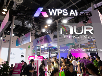 Visitors are visiting the WPS AI stand at the World Artificial Intelligence Conference at the Shanghai World Expo Exhibition Center in Shang...