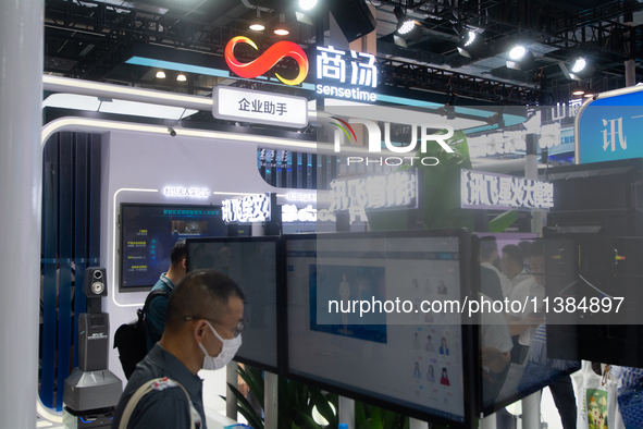 Visitors are visiting the Sensetime stand at the World Artificial Intelligence Conference at the Shanghai World Expo Exhibition Center in Sh...