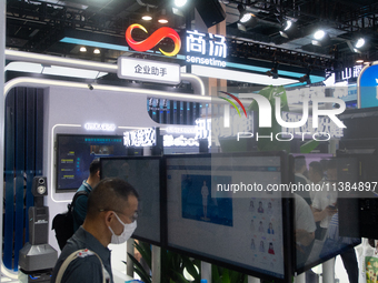 Visitors are visiting the Sensetime stand at the World Artificial Intelligence Conference at the Shanghai World Expo Exhibition Center in Sh...