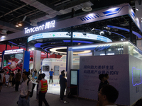 Visitors are visiting the Tencent stand at the World Artificial Intelligence Conference at the Shanghai World Expo Exhibition Center in Shan...