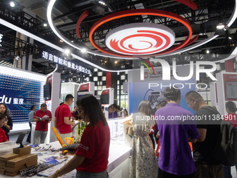 Visitors are visiting the Hanwang Technology stand at the World Artificial Intelligence Conference at the Shanghai World Expo Exhibition Cen...