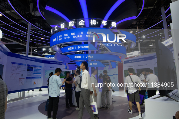 Visitors are being seen at the Baidu stand at the World Artificial Intelligence Conference at the Shanghai World Expo Exhibition Center in S...