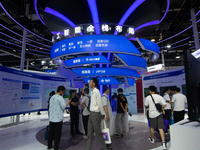 Visitors are being seen at the Baidu stand at the World Artificial Intelligence Conference at the Shanghai World Expo Exhibition Center in S...