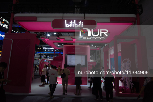 Visitors are being seen at the Bilibili stand at the World Artificial Intelligence Conference at the Shanghai World Expo Exhibition Center i...