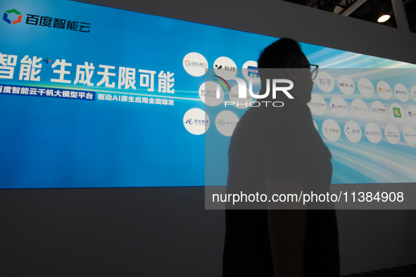 Visitors are being seen at the Baidu stand at the World Artificial Intelligence Conference at the Shanghai World Expo Exhibition Center in S...