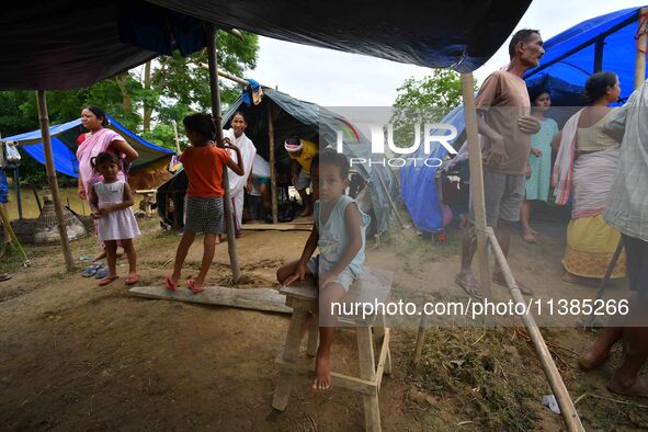 Flood-affected children are staying at a relief camp during the flood near Kampur in Nagaon District of Assam, India, on July 5, 2024. 