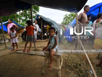 Flood-affected children are staying at a relief camp during the flood near Kampur in Nagaon District of Assam, India, on July 5, 2024. (