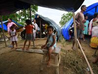 Flood-affected children are staying at a relief camp during the flood near Kampur in Nagaon District of Assam, India, on July 5, 2024. (