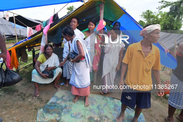 Flood-affected villagers are staying at a relief camp during the flood near Kampur in Nagaon District of Assam, India, on July 5, 2024. 