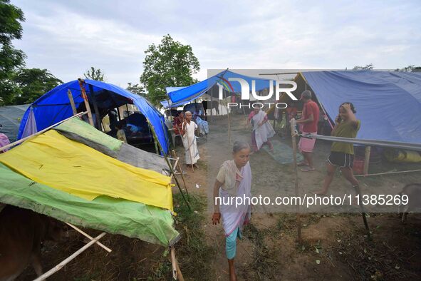 Flood-affected villagers are staying at a relief camp during the flood near Kampur in Nagaon District of Assam, India, on July 5, 2024. 