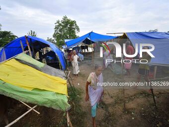 Flood-affected villagers are staying at a relief camp during the flood near Kampur in Nagaon District of Assam, India, on July 5, 2024. (