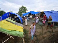 Flood-affected villagers are staying at a relief camp during the flood near Kampur in Nagaon District of Assam, India, on July 5, 2024. (