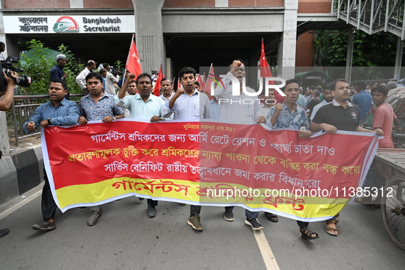 Activists of the Garments Workers Front are staging a protest rally demanding payment of ration and dearness allowance for garment workers i...