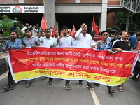 Activists of the Garments Workers Front are staging a protest rally demanding payment of ration and dearness allowance for garment workers i...