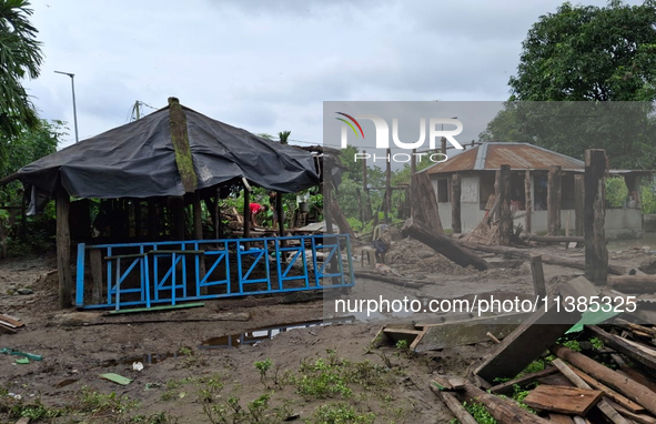 Houses are being seen as the Teesta River water enters Laltong forest village due to heavy and continuous rainfall in the area. The village...